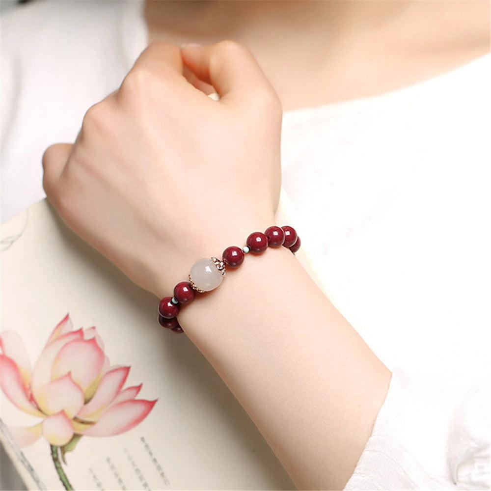 Jade & Zinnober Perlen-Armband "Transformative Kraft"