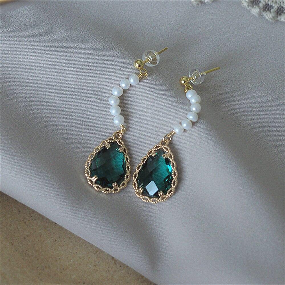 Ohrringe "Luxus" mit Vintage-Zirkon und Perle